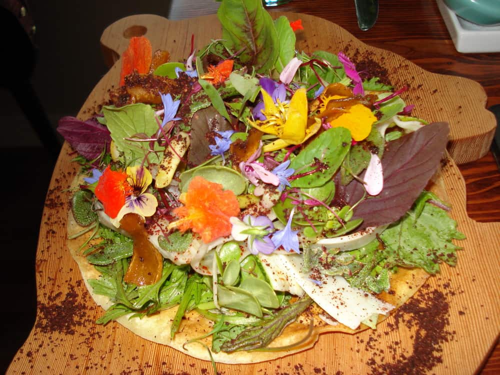 DSC01548 Flatbread with fresh greens, vegetables, flowers from the garden with pecorino cheese