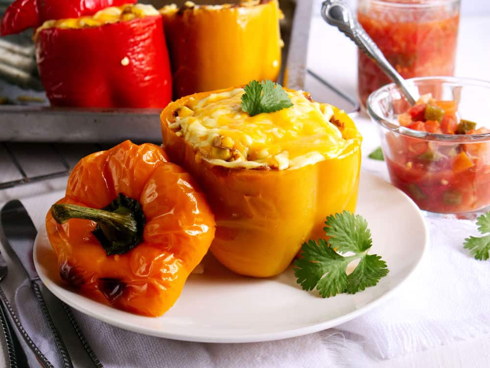 Healthy Stuffed Vegetarian Peppers served on a white plate