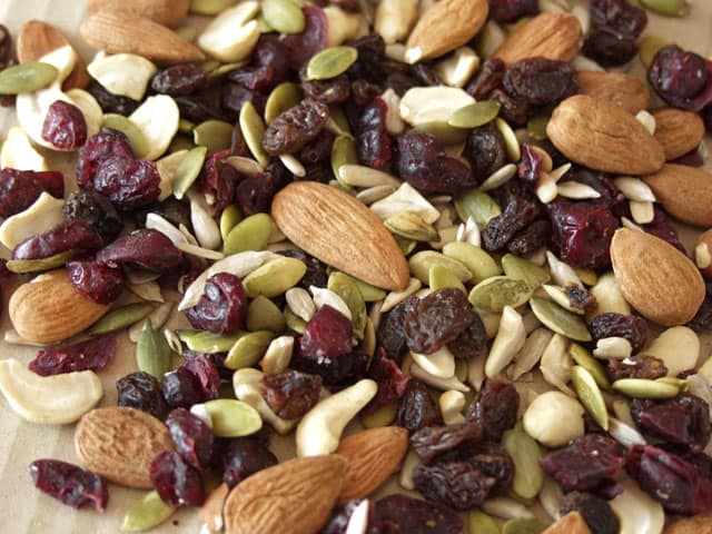 raw healthy trail mix, healthy plane snacks, with almonds, cashews, pumpkin seeds, and dried fruit