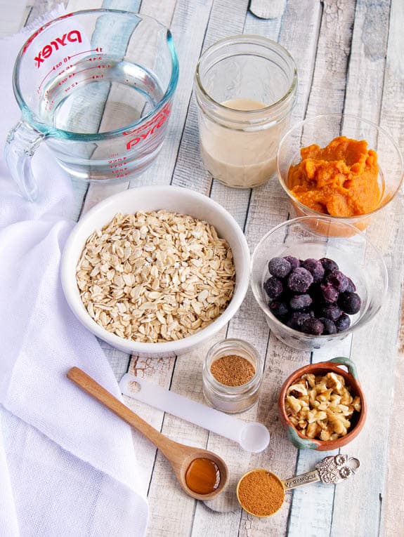 Ingredients for Pumpkin Spice Oatmeal with berries and pumpkin