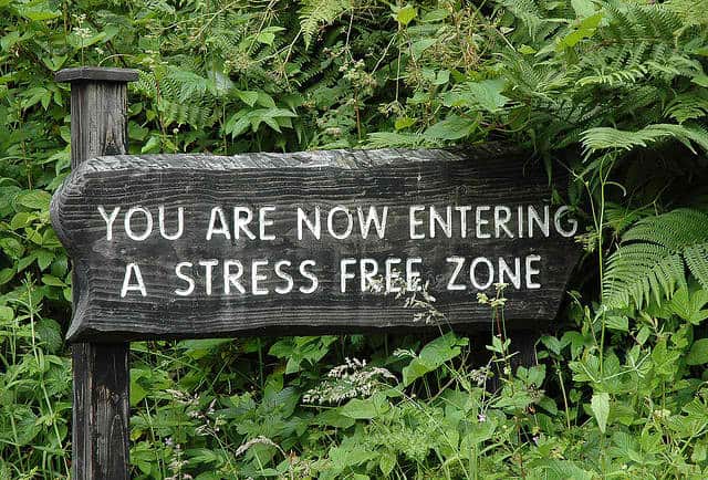 You are now entering a stress free zone sign on wooded path -  Source: TheStepMomsToolBox