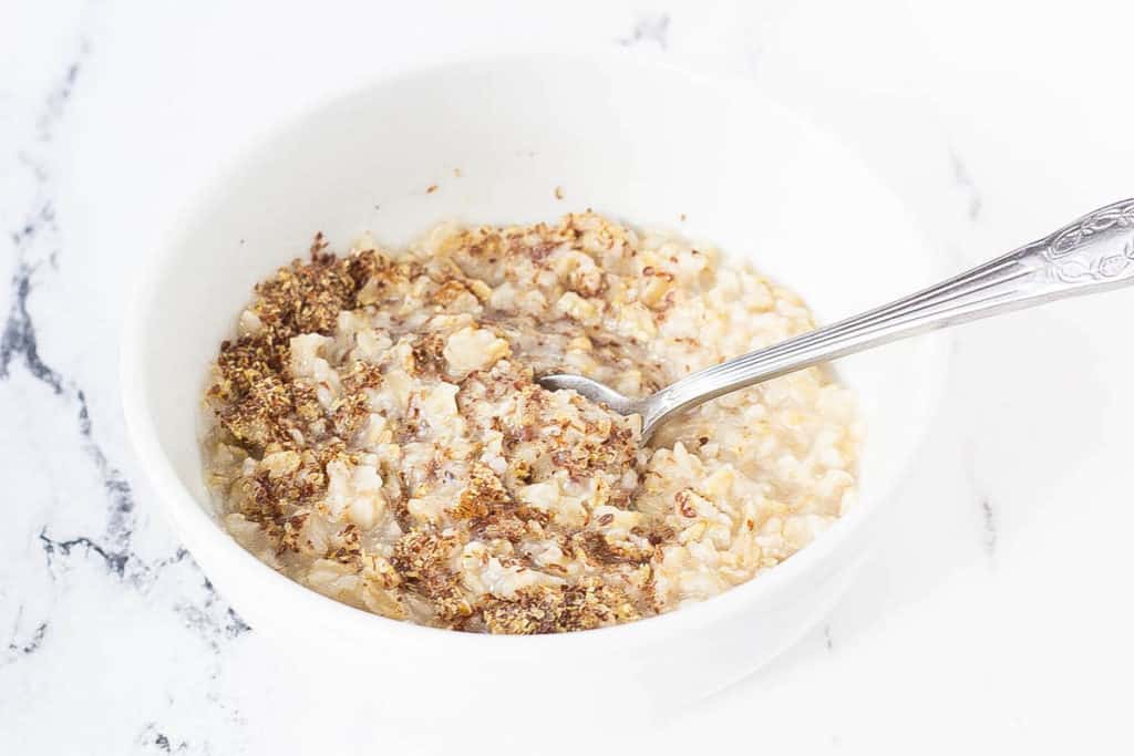 oats mixed with flax in a bowl