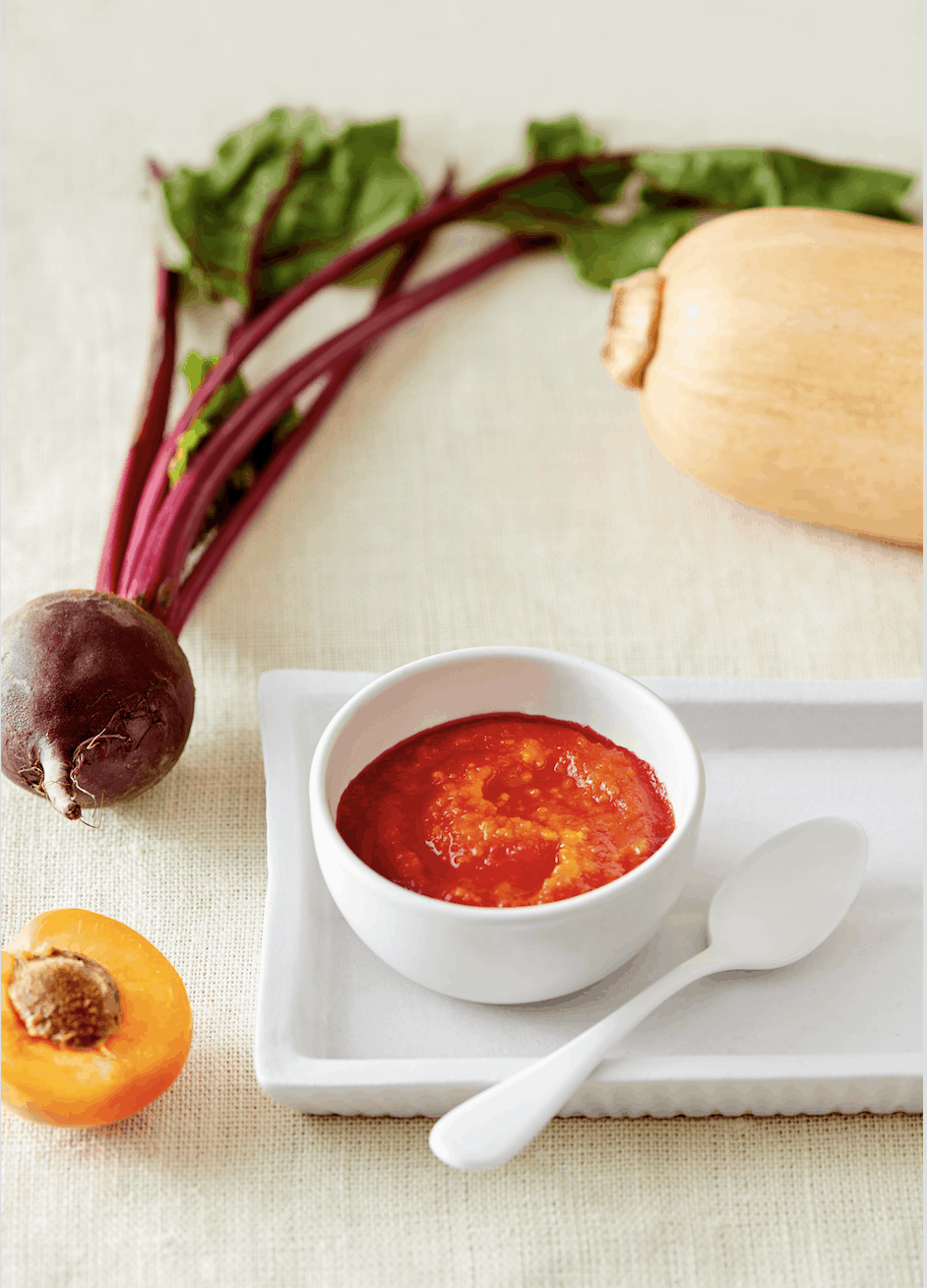 healthy homemade baby foods (photo of homemade baby food in a white bowl with a spoon)