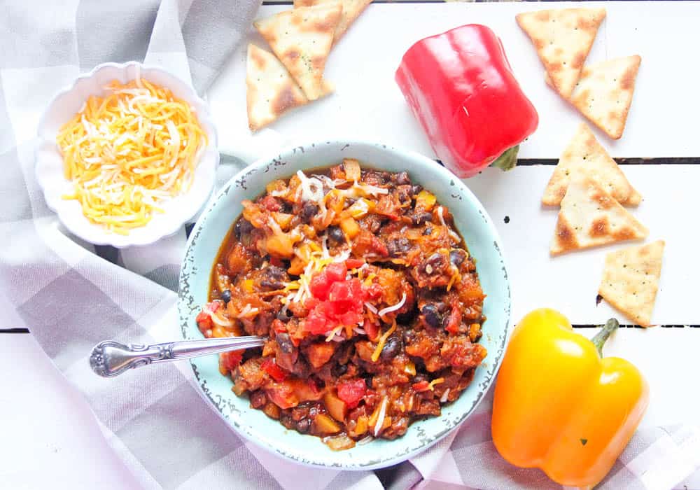 Sweet potato hash in a bowl on a wooden table