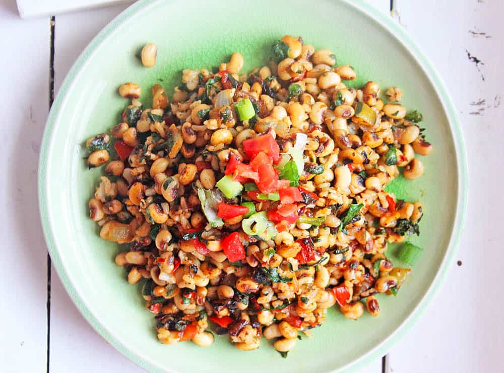 vegetarian black eyed peas recipe served on a plate with green onions