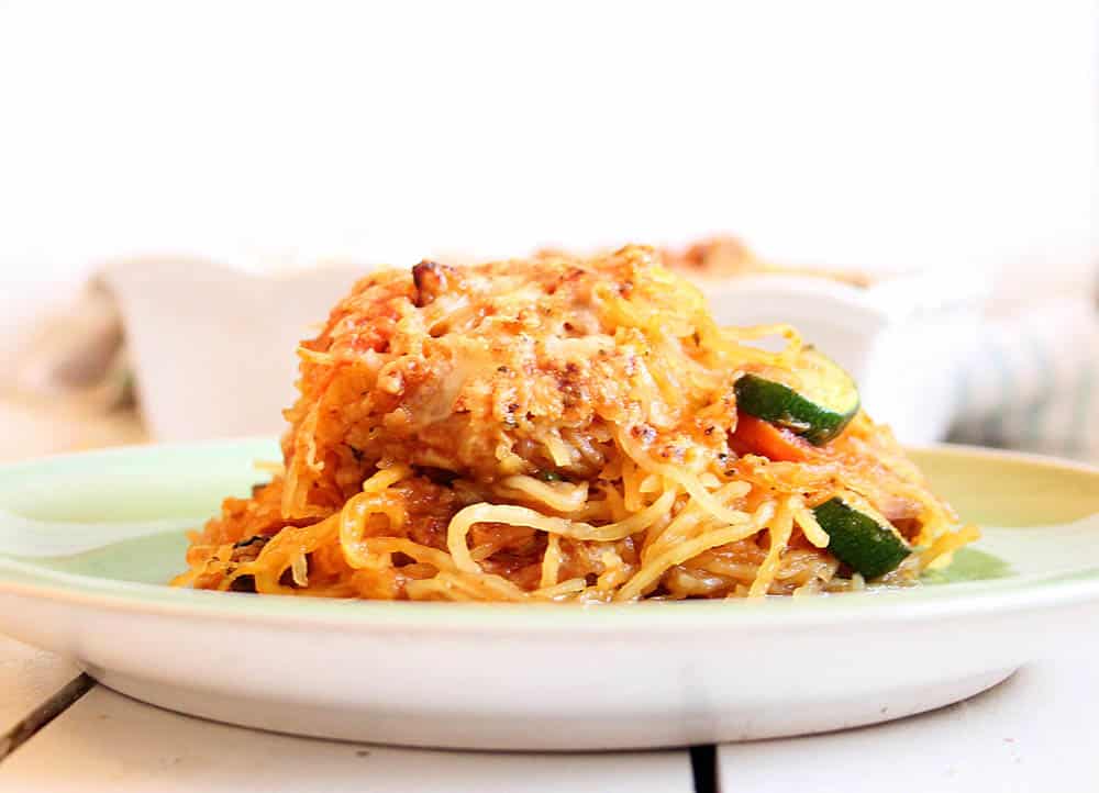 Spaghetti squash casserole served on a white plate