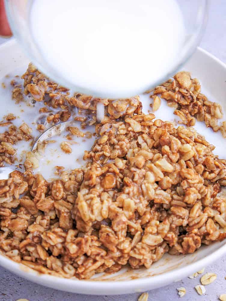 Milk being added to the chocolate oatmeal