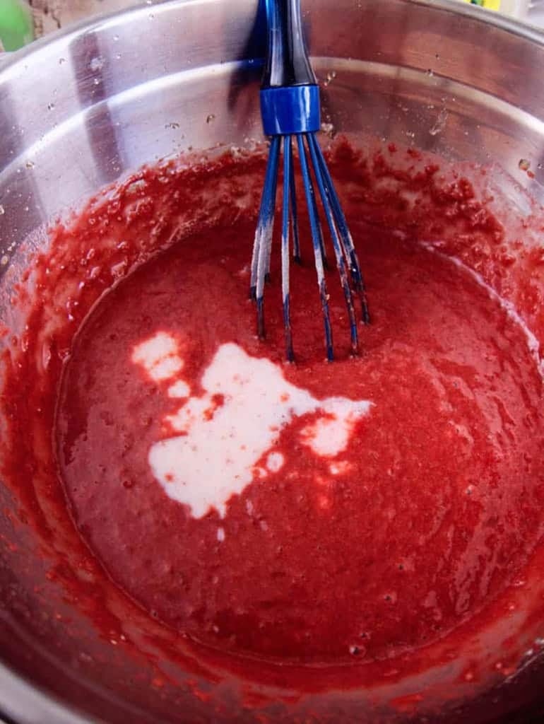 Healthy red velvet cupcake batter in a mixing bowl.