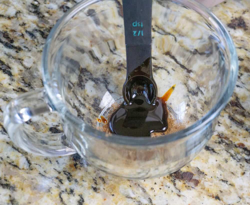 molasses and spices being stirred together
