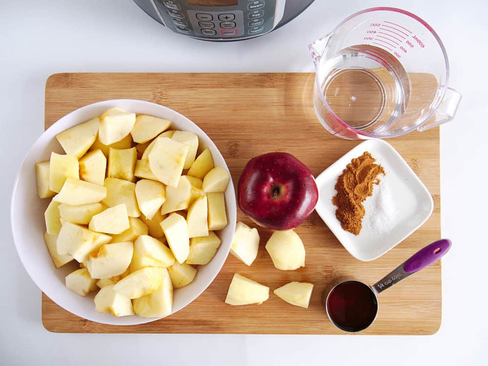 ingredients for instant pot applesauce - apples, cinnamon, water, honey