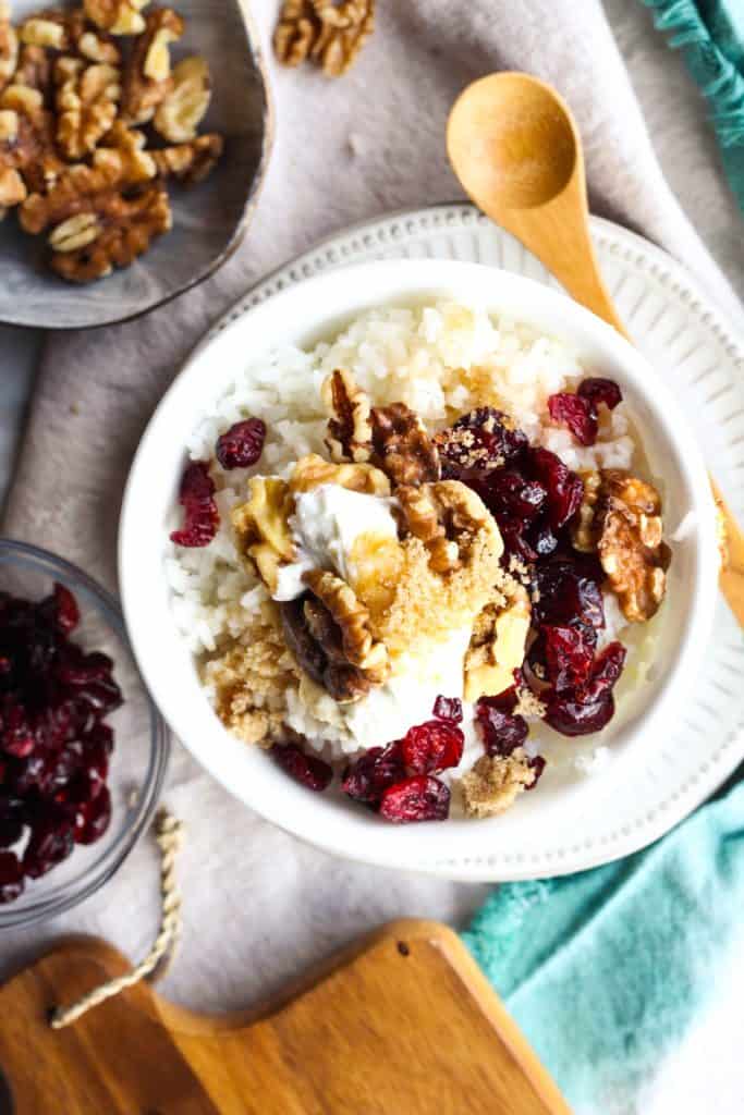 photo of oatmeal with nuts and dried fruit, top view