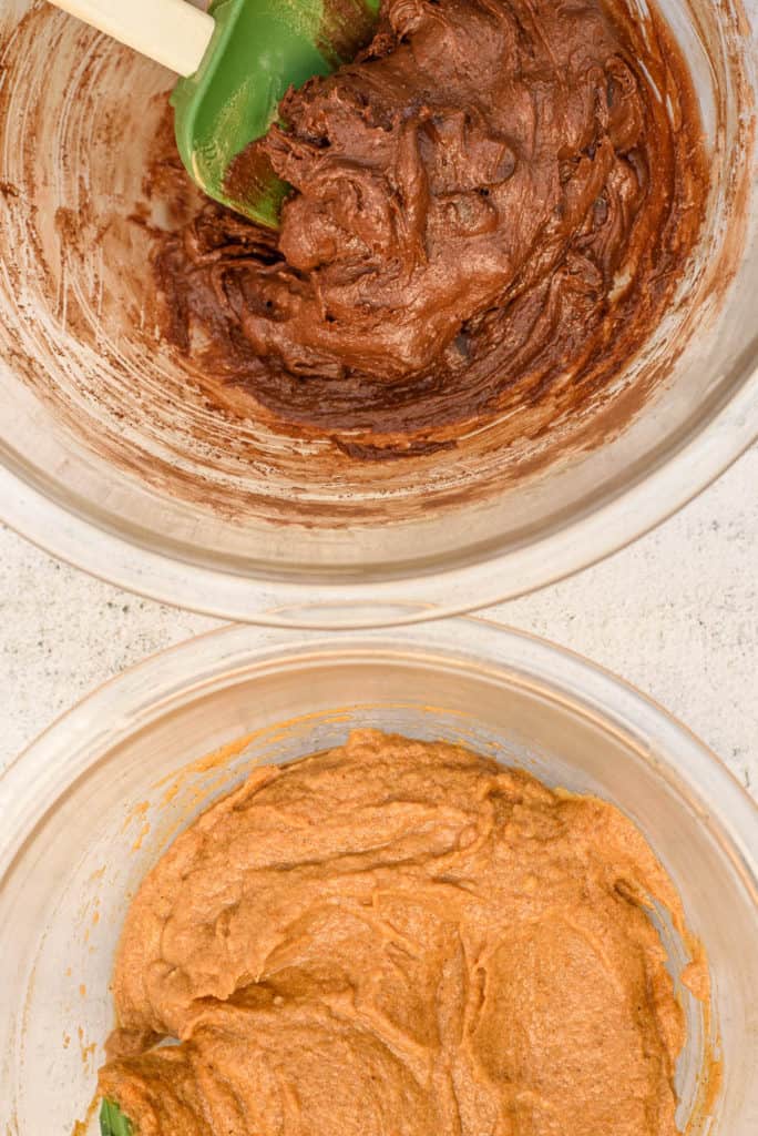 wet ingredients and dry ingredients for brownies in two glass bowls