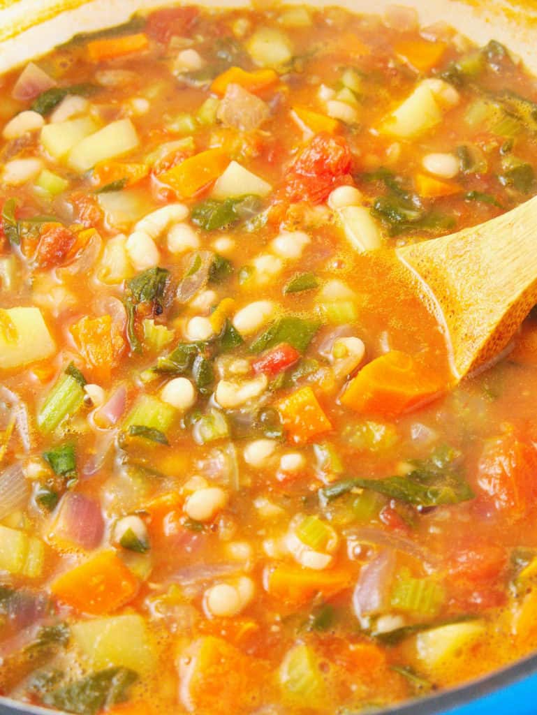 completed healthy minestrone soup in a large stock pot