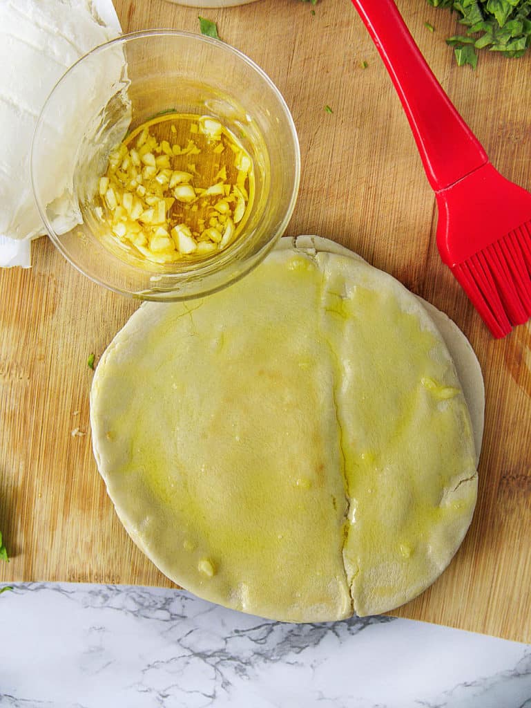 pita bread brushed with olive oil and garlic