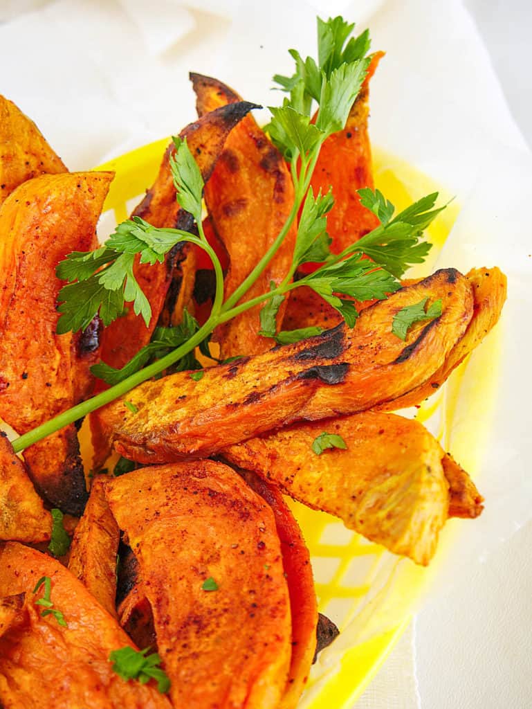 air fried sweet potato fries in a yellow basket