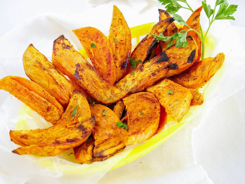 air fried sweet potato fries in a yellow basket