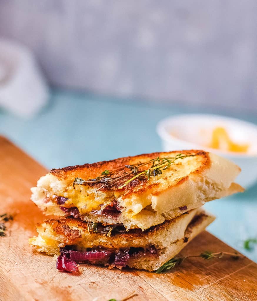 garlic bread grilled cheese cut in half and stacked