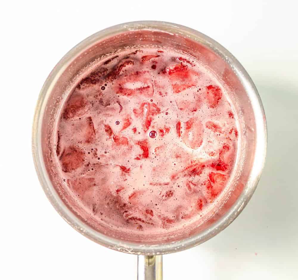 strawberries simmering in a pot