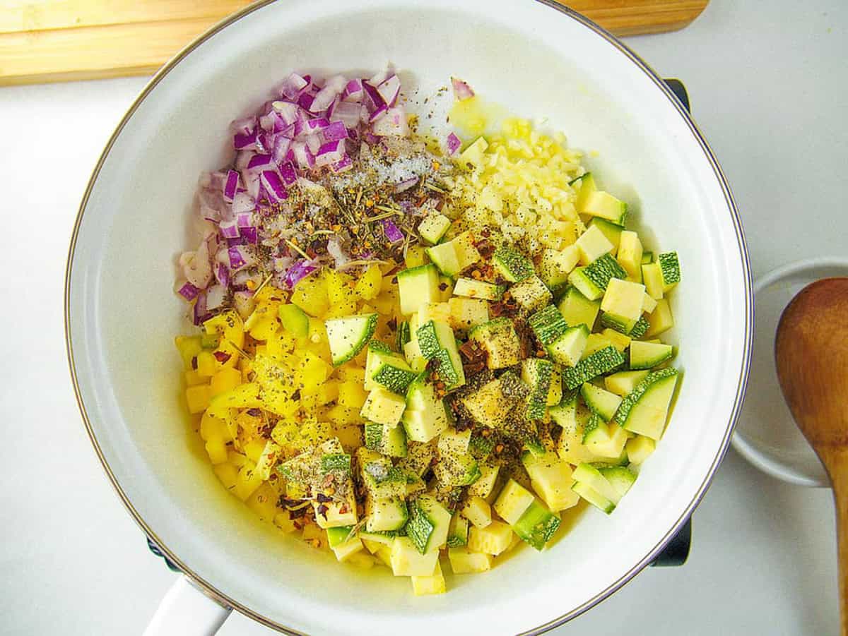 Diced veggies in a pot.