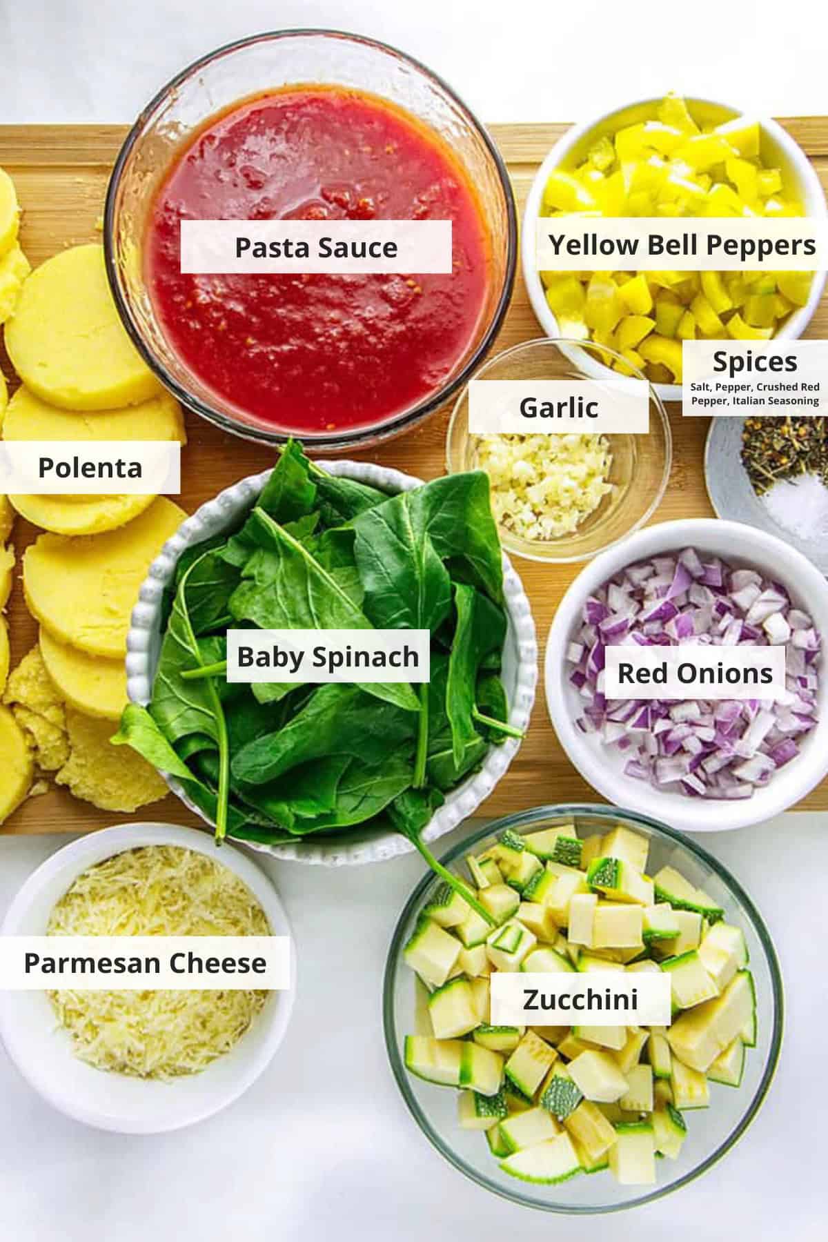 Ingredients for vegetarian polenta lasagna on a countertop.