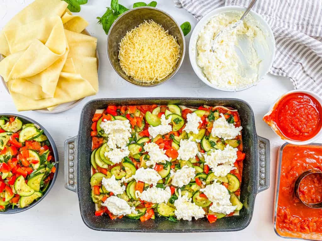 easy hearty healthy vegetable lasagna recipe layered and ready to be baked