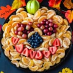 pumpkin face fruit tray with oranges