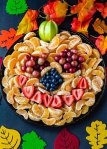 pumpkin face fruit tray with oranges