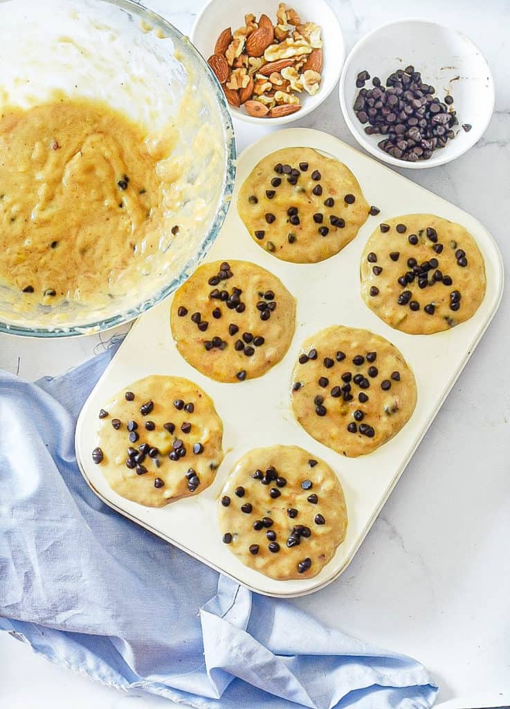 muffin tins filled with batter