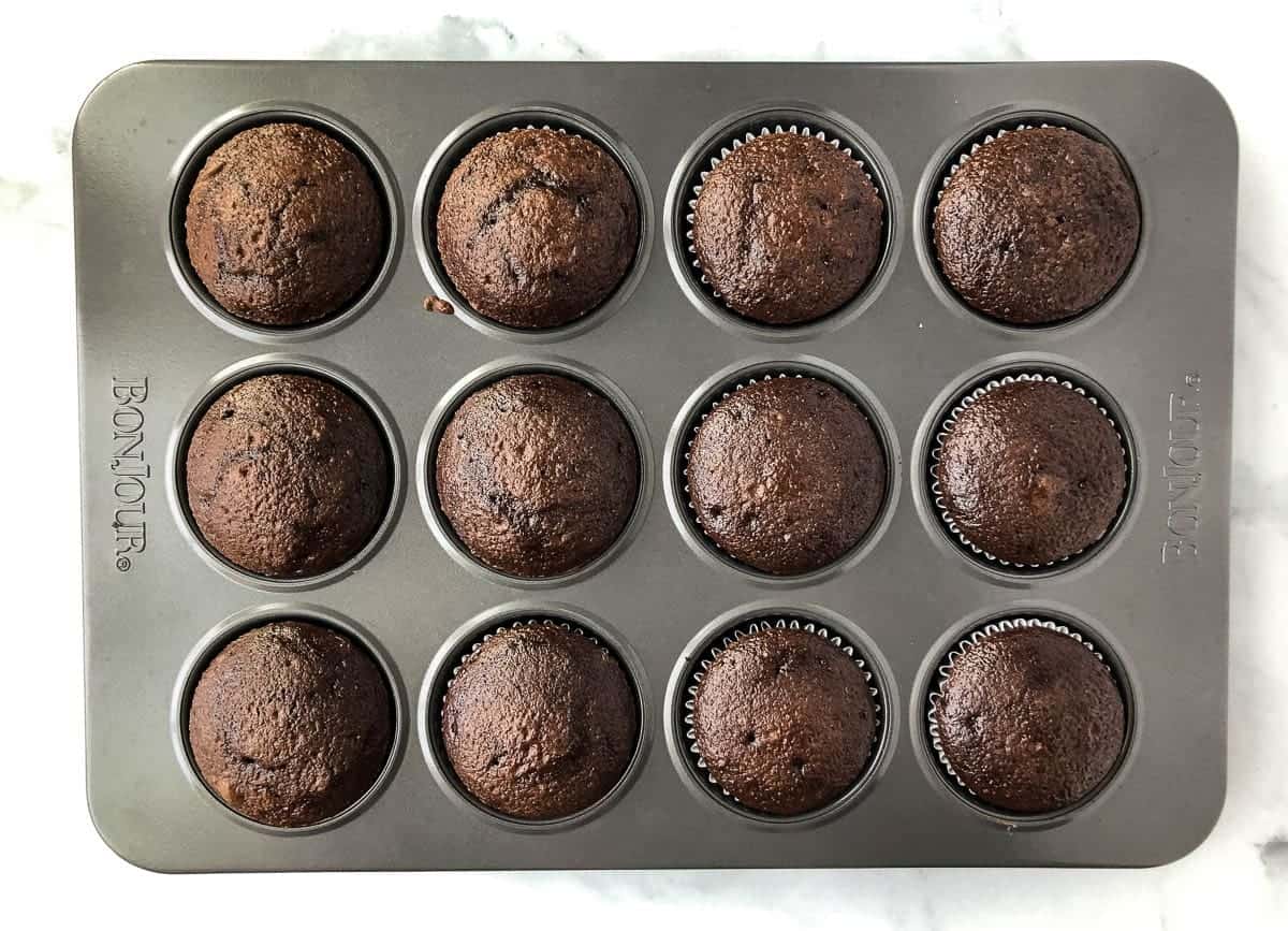 baked chocolate cupcakes in cupcake tin