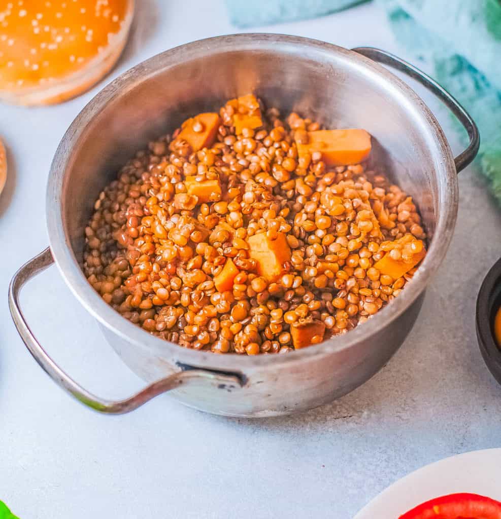 sweet potatoes and lentils cooking a in a pot