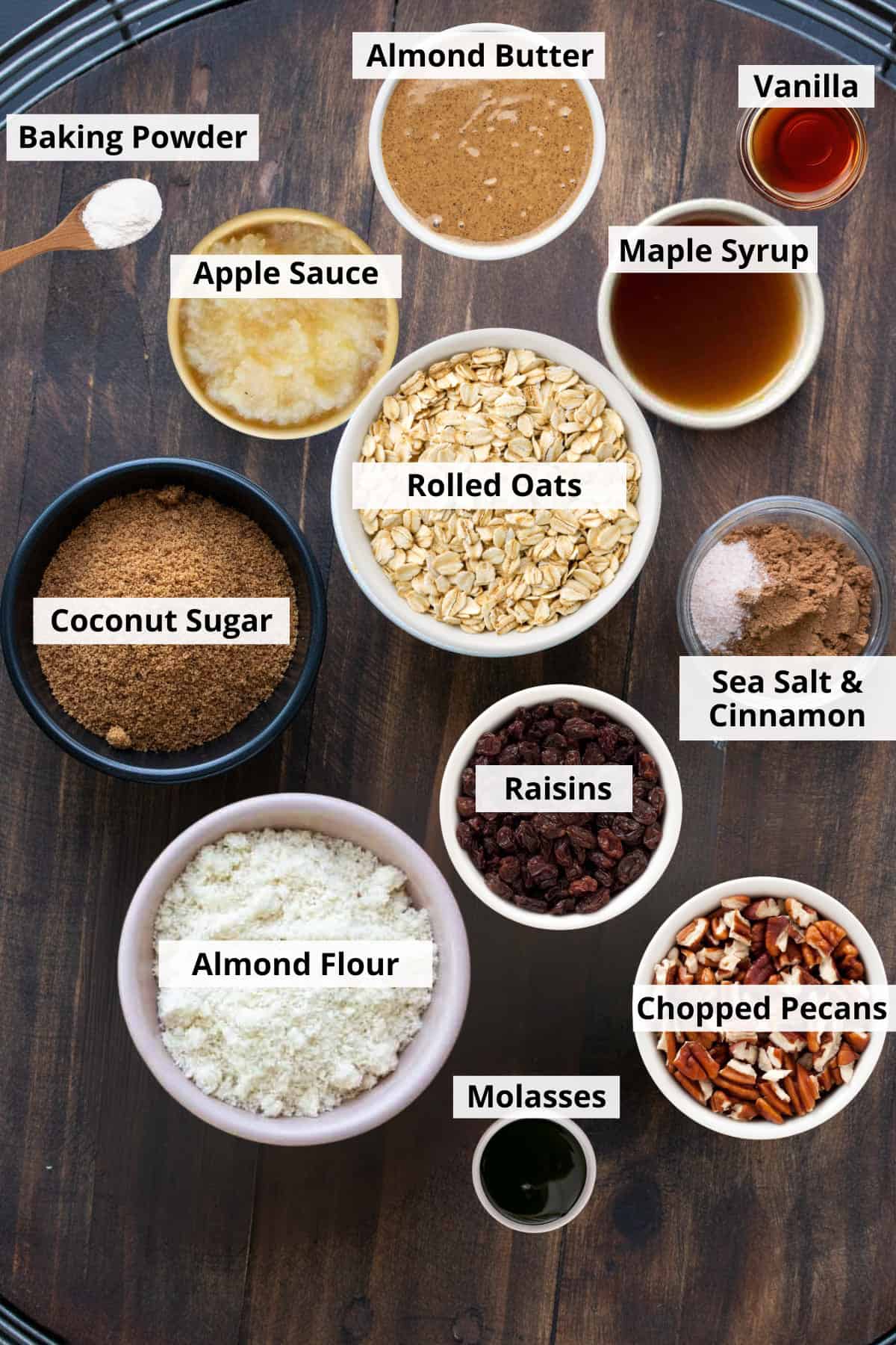 Overhead shot of ingredients for vegan gluten free oatmeal cookies in individual bowls.