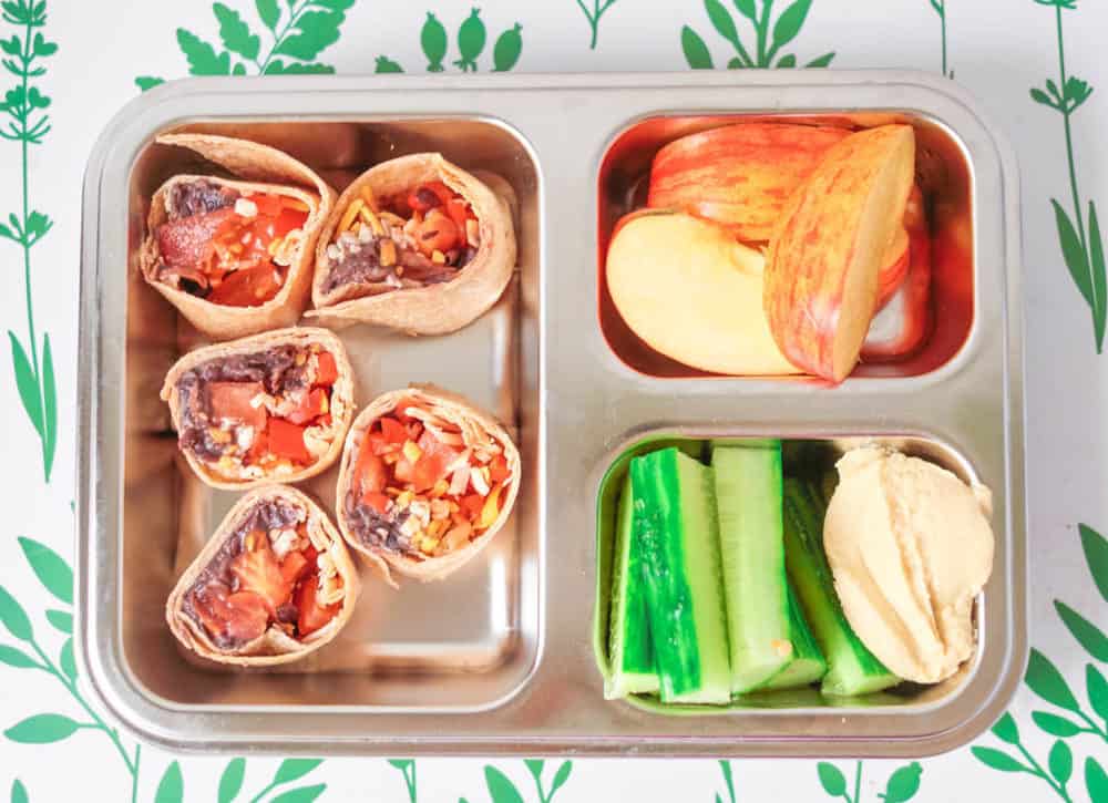 Healthy toddler lunches  - burrito wraps, apples and cucumbers with hummus