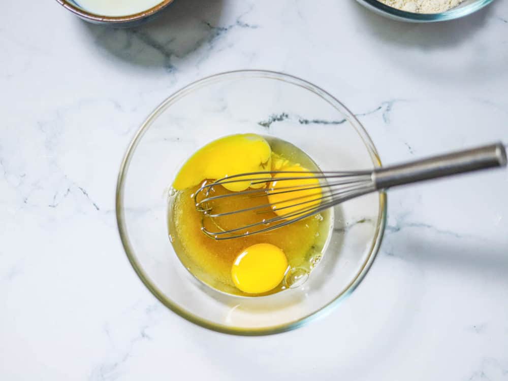 eggs being whisked in a bowl