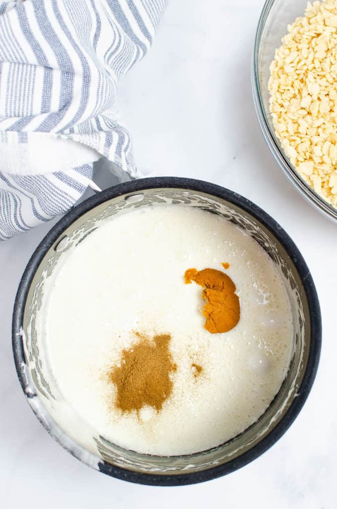 spices added to marshmallow mixture in a pot