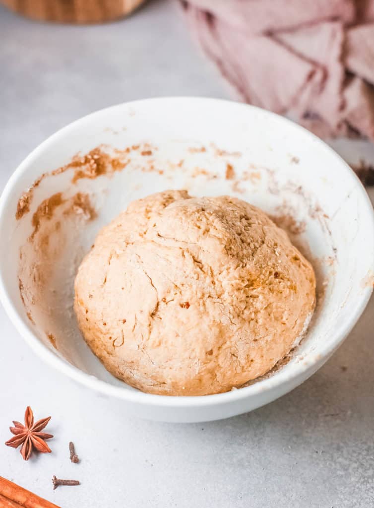 cinnamon roll dough combined in a bowl