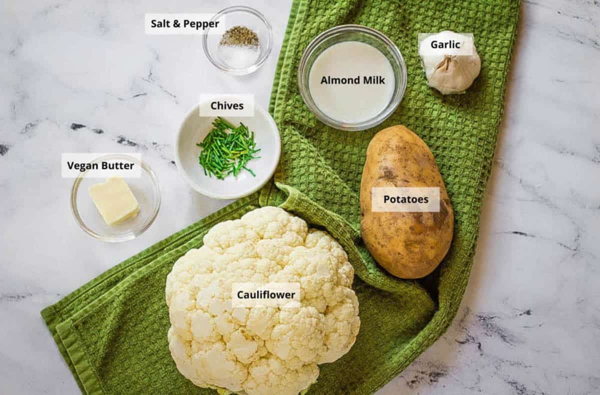 Ingredients for healthy mashed potatoes recipe on a white background.