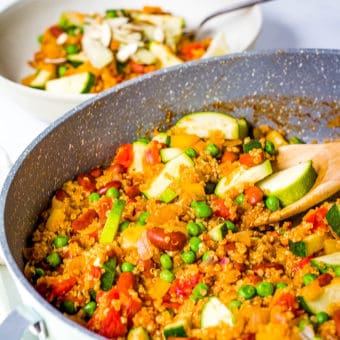 finished vegetarian paella made with fresh vegetables and quinoa