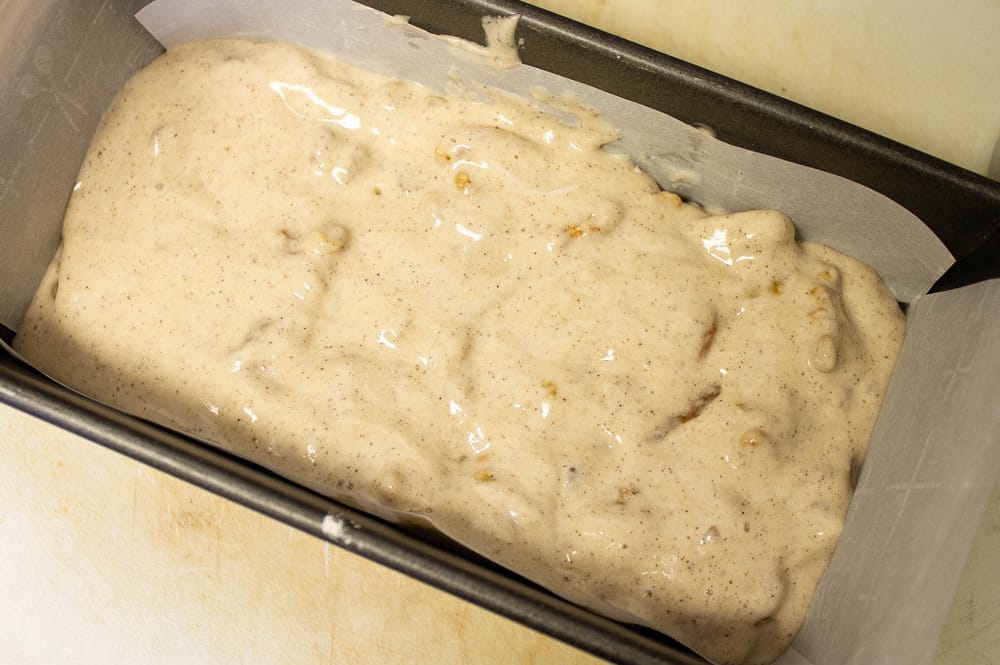 dough in a loaf pan ready to go into the oven