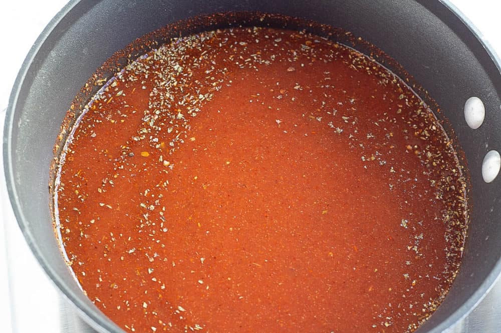 red sauce simmering in a pot