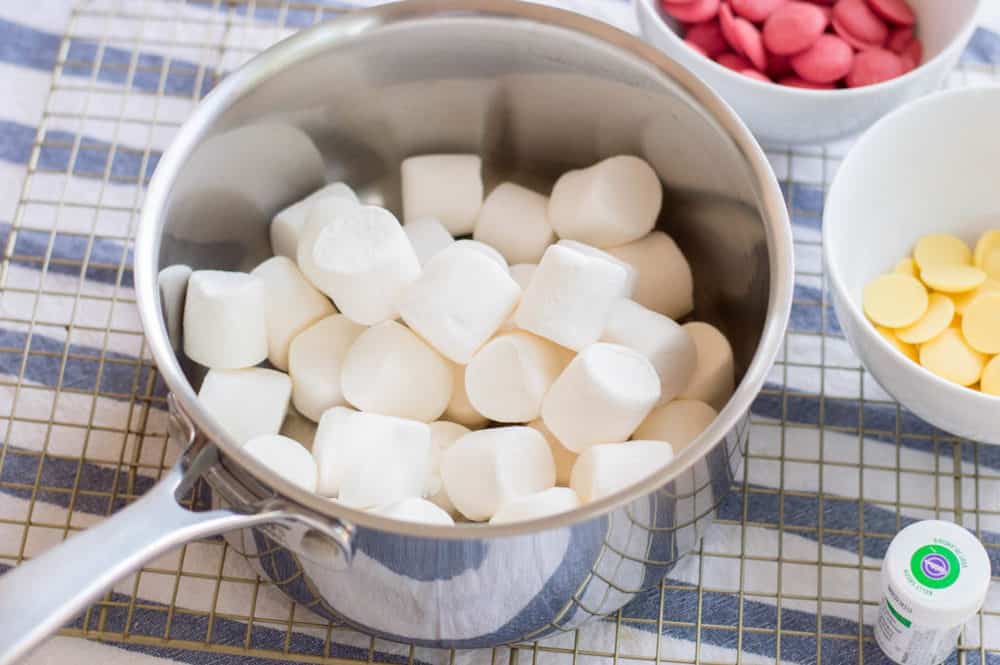 marshmallows being melted in a pot