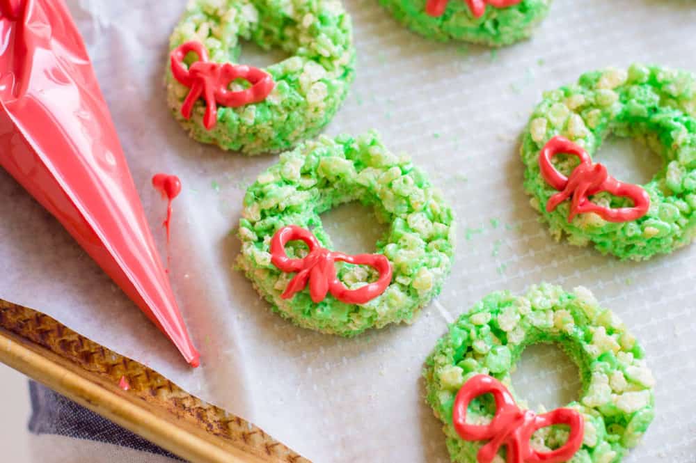 Christmas Rice Krispie Treats with Candy Ribbons on a baking sheet