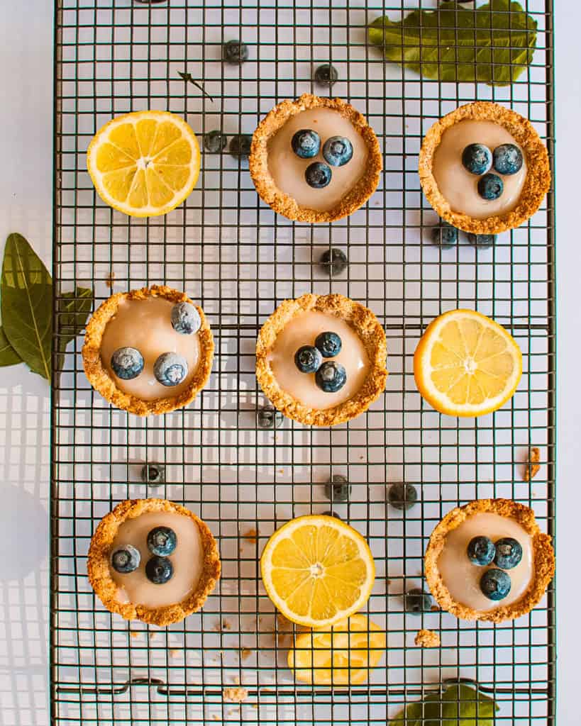 Lemon Tartlets with Coconut Milk Filling on a wire rack