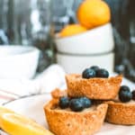 Lemon Tartlets with Coconut Milk Filling on a white plate