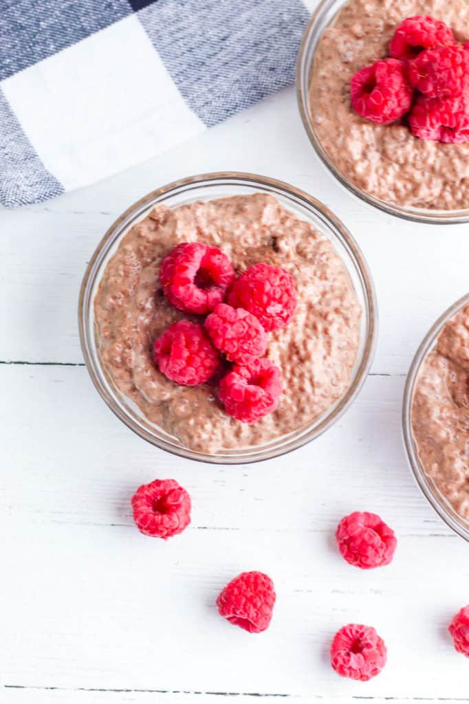 vegan chocolate mousse topped with raspberries