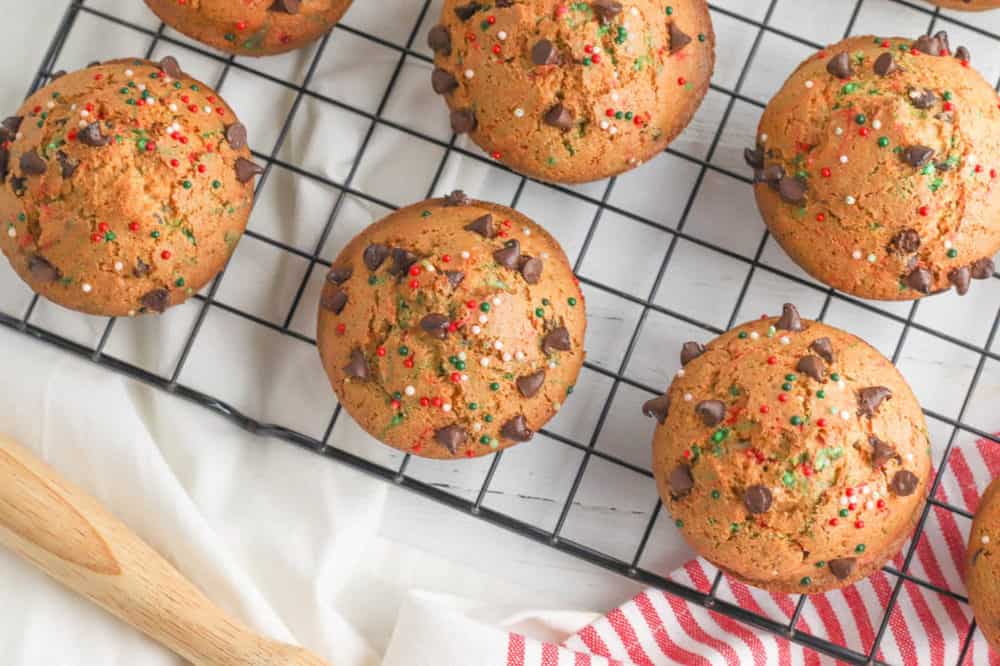 christmas muffins with chocolate chips on a wire rack