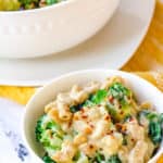 healthy mac and cheese with broccoli served in a white bowl