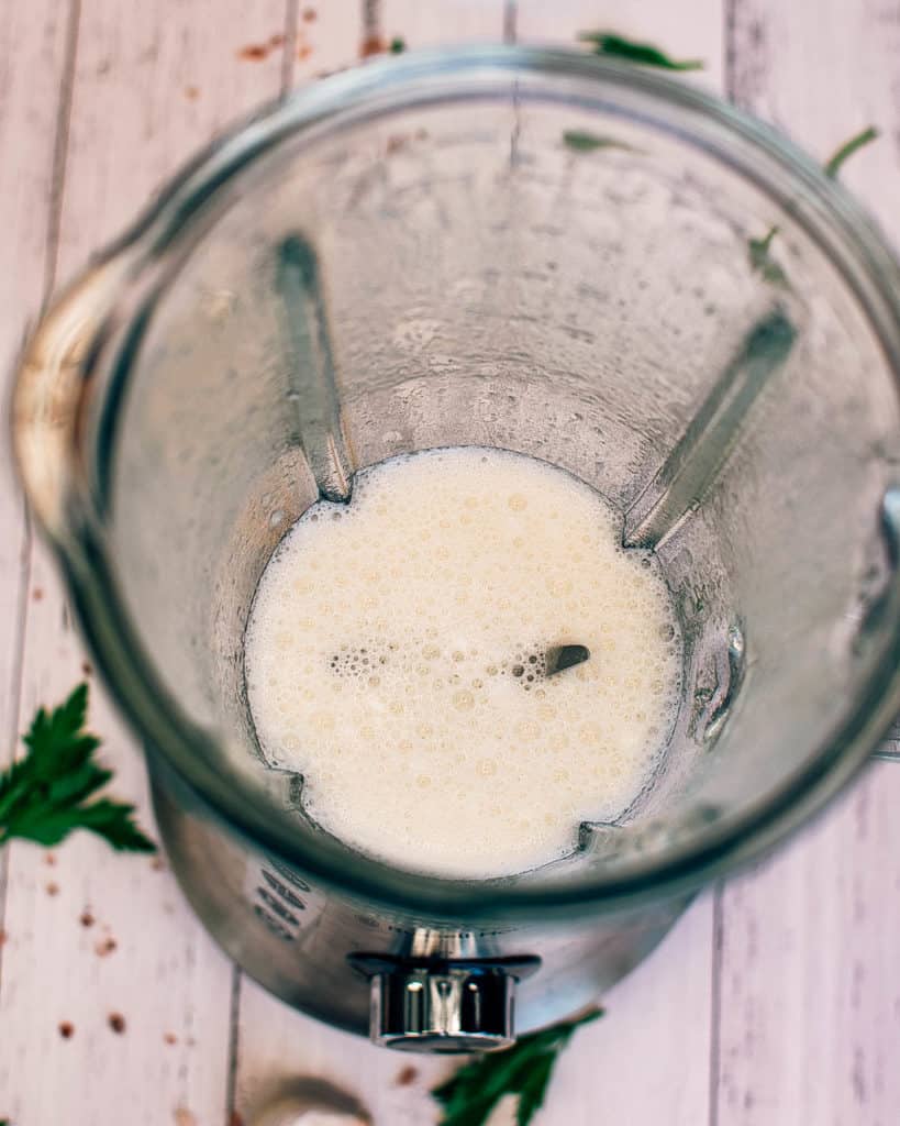 aquafaba and other aioli ingredients added to blender