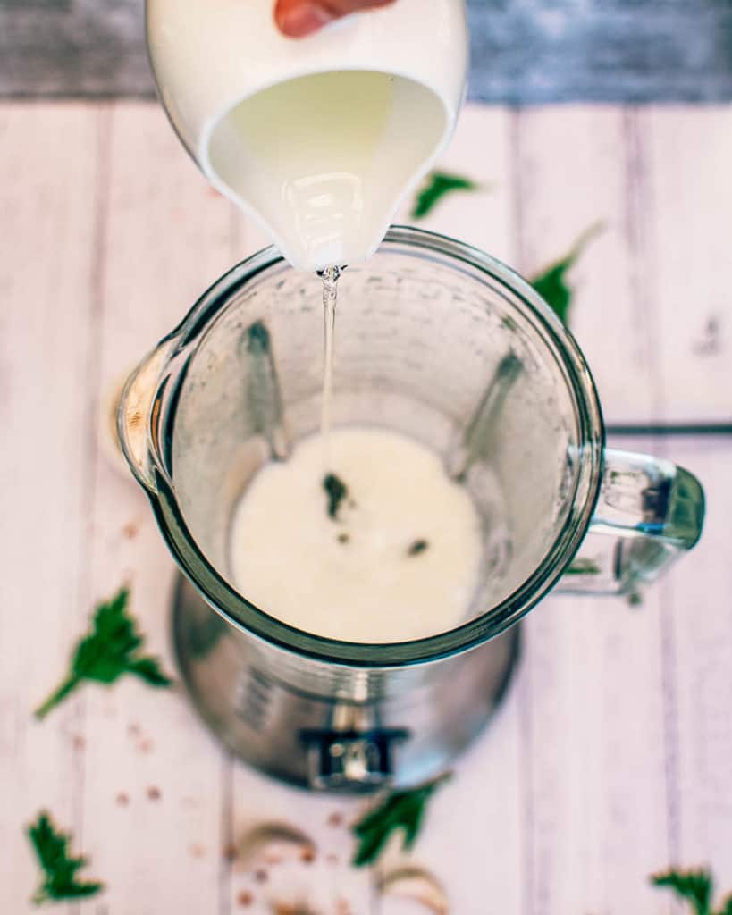 aquafaba and other aioli ingredients added to blender