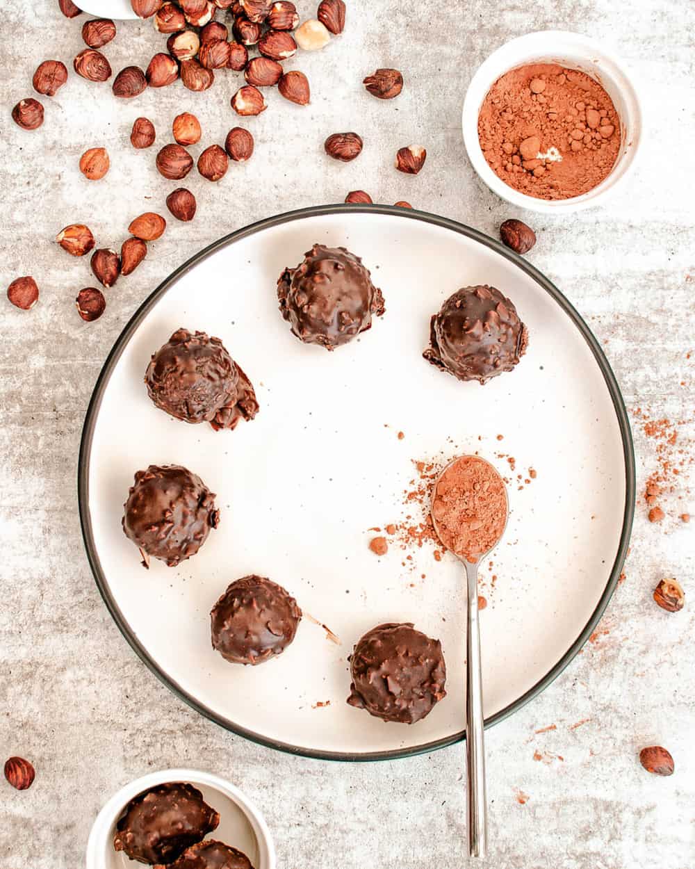 ferrero rocher recipe - hazelnut chocolate bites on a plate