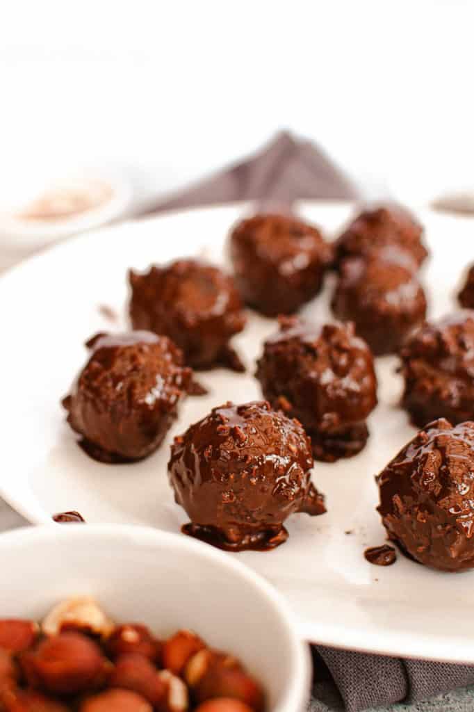 ferrero rocher recipe - hazelnut chocolate bites on a plate